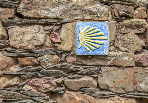 Road sign of Camino de Santiago, pilgrimage route to the Cathedral of Santiago de Compostela
