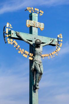 Crucifix on the Charles bridge in Prague, Czech Republic