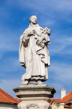 Statue of Philip Benizi de Damiani on the Charles bridge in Prague, Czech Republic