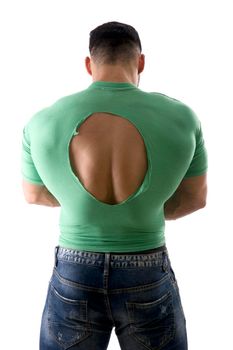Back view of anonymous muscular male in torn t shirt standing on white background in studio and demonstrating power