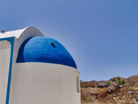 The roof of a small christian church in the island of Santorini,Greece.