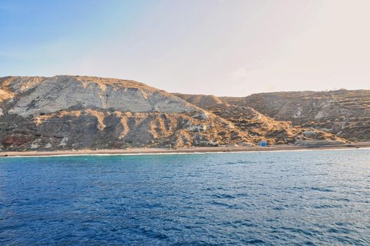 Village with port on the island Thirassia. It's a small island located next to Santorini and is ideal for daily trips.