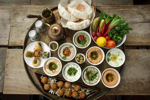 mixed middle eastern meze vegetarian food sharing platter in istanbul turkish restaurant