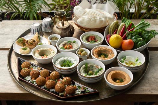 mixed middle eastern meze vegetarian food sharing platter in istanbul turkish restaurant