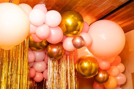 Stylish metallic pink balloons for Valentine's day, hen party or baby shower on a white background.