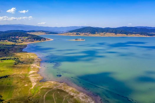 Scenic aerial view with a drone of an amazing Batak dam, Bulgaria with crystal water