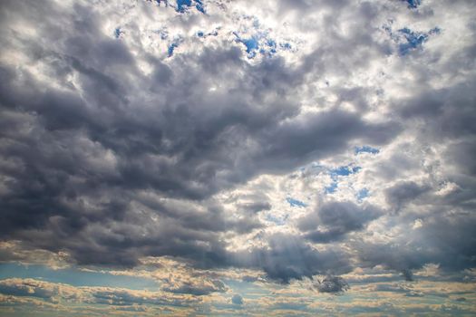 The vast blue cloudy sky. Horizontal view