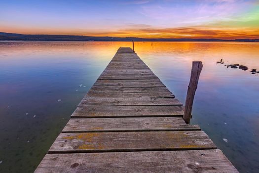 Stunning view from the shore with a wooden pier