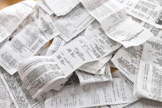High Angle Full Frame Image of Receipts Ready for Accounting, Bookkeeping, Tax, Filing, Budgeting, or Record Keeping