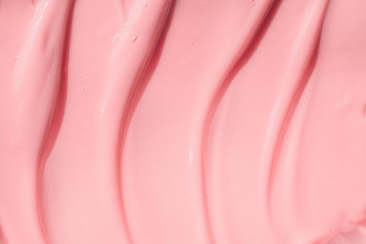 Moisturizing beauty creme, balm swatch, pink paint, yogurt texture. Peach cream, moisturizer, shampoo spread, sunscreen cosmetic smear background. Creamy pink skincare lotion mousse product closeup.