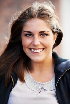 Portrait of an attractive young woman outdoors in the city.