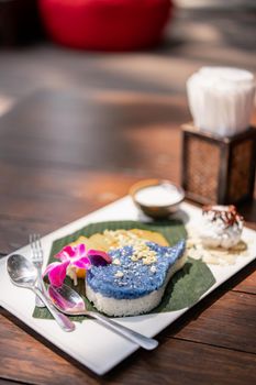 Blue sticky rice with sweet ripe mango. (Khao Nieow Ma Muang) Thai dessert.