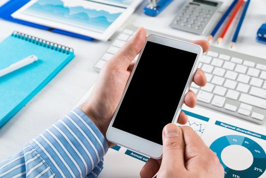 close-up of men's hands with a phone. Office work