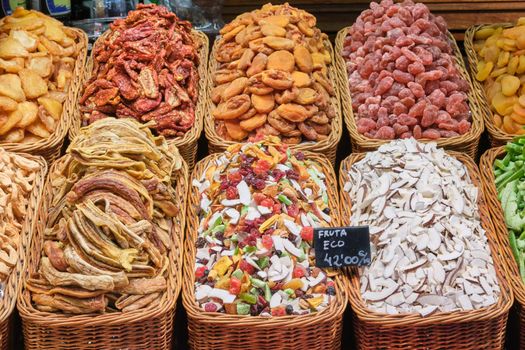 Great choice of dried fruits for sale at the Boqueria market in Barcelona