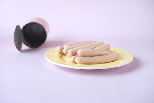sausage in a tin container on color background .