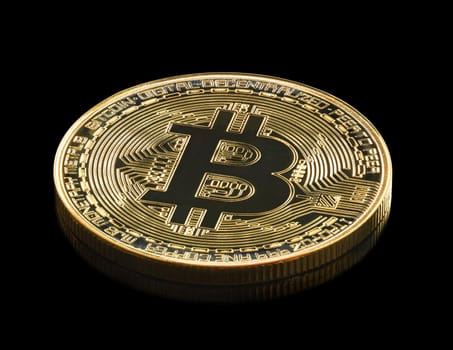 Bitcoin cryptocurrency digital bit coin BTC currency concept ,Golden coins with bitcoin symbol on a black background
