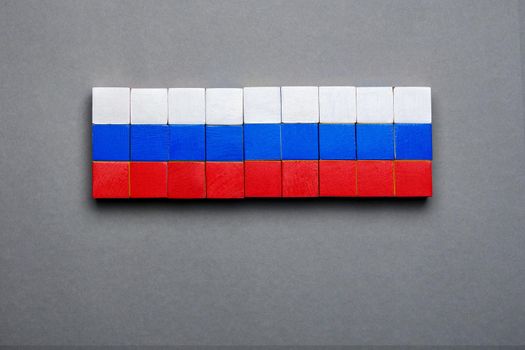 Isolated block toy wood cube made flag of Russia design background flag concept. Wooden block background Russian banner design national flag symbolic Russia symbol national banner background RU sign