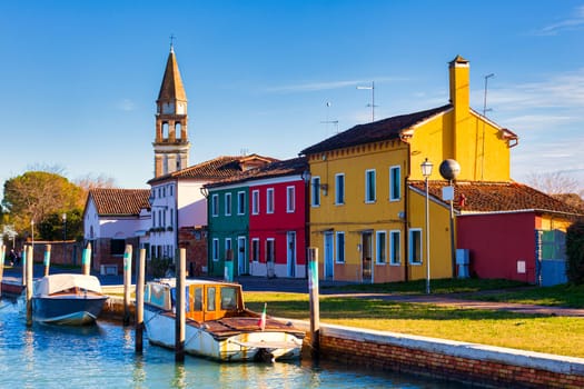 View of the San Michele Arcangelo bell tower and the colorful houses of Mazzorbo, Venice