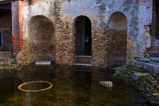 Torcello, Italy - January, 06: Arches of the Santa Fosca Church in Torcello on January 06, 2022