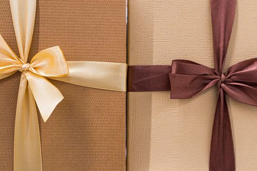 festive multicolored boxes with ribbons large as background. photo