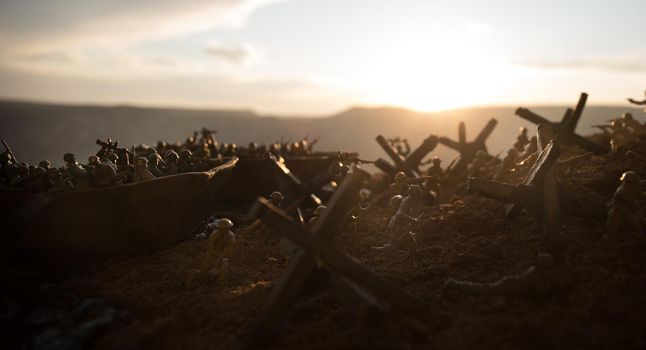 World War 2 reenactment (D-day). Creative decoration with toy soldiers, landing crafts and hedgehogs. Battle scene of Normandy landing on June 6, 1944. Selective focus