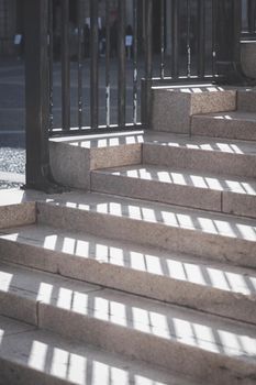 Gray shadows on the stairs from the sun, abstract background. Minimal concept. Industrial technology concept. Art photo.