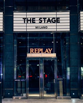 Milan, Italy - 17.12.2020. Replay shop front and logo signboard over the entrance of the store. Replay is fashion clothing store, italian fashion company founded in 1978.