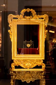 Women luxury handbag in a Dolce and Gabbana store in Milan. Fashion shop display. Luxury store appearance. Showcase window. Stylish woman's bag on shelf of boutique. Milan, Italy - September 24, 2020.