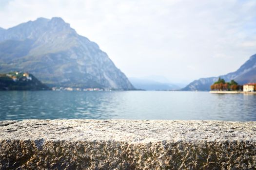 Showcase, podium for cosmetic products and blurred mountain lake landscape in background. Nature pedestal for products. .