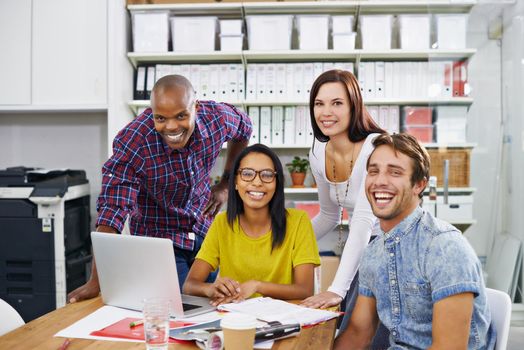 Shot of a young designers at work in an office.