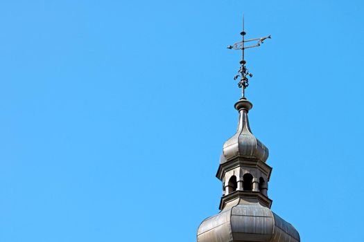 The dome of the castle against the blue sky. Architecture