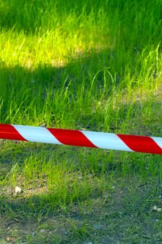 Red and white clutter ribbon. It is forbidden