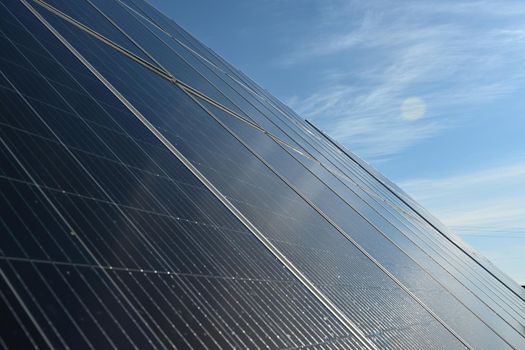 Solar panels high resolution side view against a clear blue sky