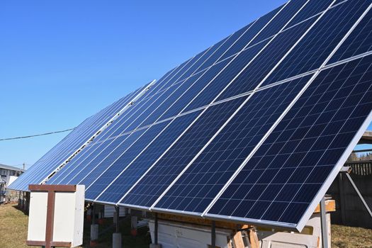 High resolution photo of solar panels against a clear blue sky in good weather