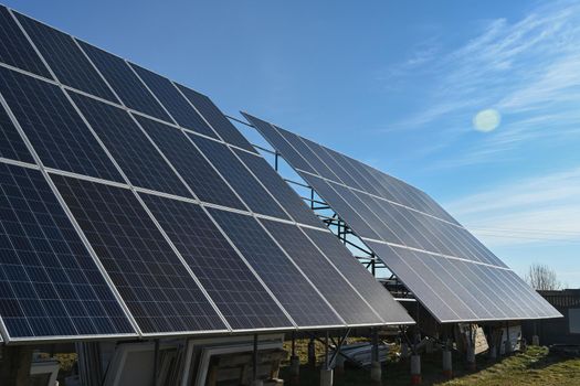 Photo of solar panels against a clear blue sky