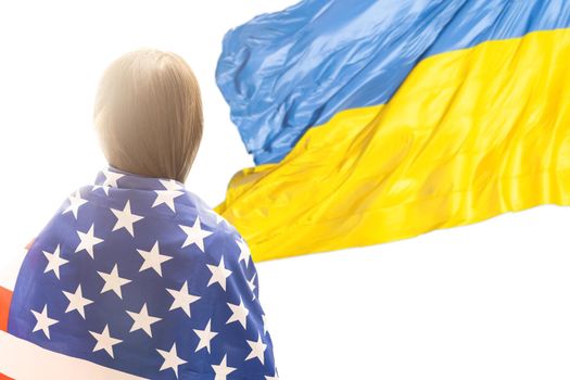 little girl with usa flag on the background of the Ukrainian flag.