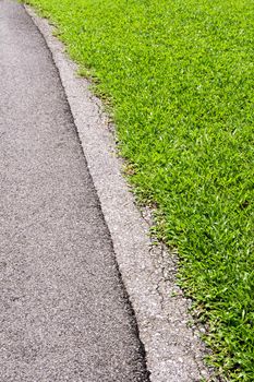 Walkways and concrete edges beside the lawn