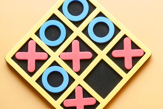 child interaction leisure board game on yellow .