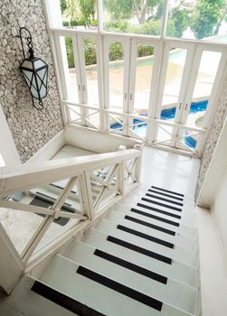 Beautiful white tone vintage stairs hall