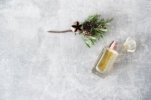 bottle of woman perfume on gray background, top view, flat lay. Mockup of gold fragrance perfume bottle mockup on empty background.