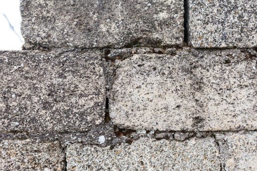 Texture of a stone wall. Old castle stone wall texture background. Stone wall as a background or texture. Part of a stone wall, for background or texture