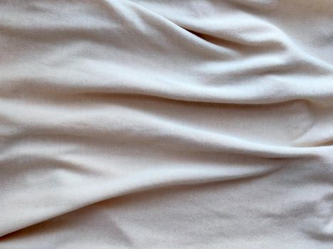 white draped cotton material for textile background.