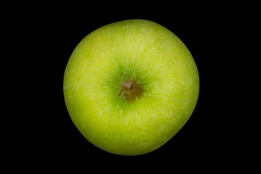 Fresh green apple and sliced isolated on black background art abstract concept.