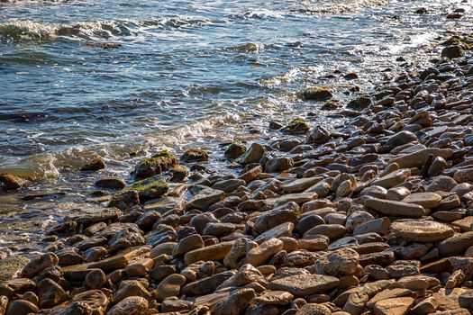 At a stone coastline at the Black sea. Relaxing horizontal view.