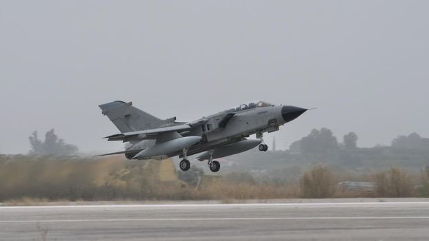 Andravida Greece APRIL, 1, 2022 Tornado twin-engine, variable-sweep wing multirole combat aircraft take off. Panavia Tornado IDS ECR of Italian Air Force