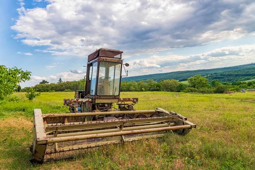 Vintage combine harvester for grain in the field