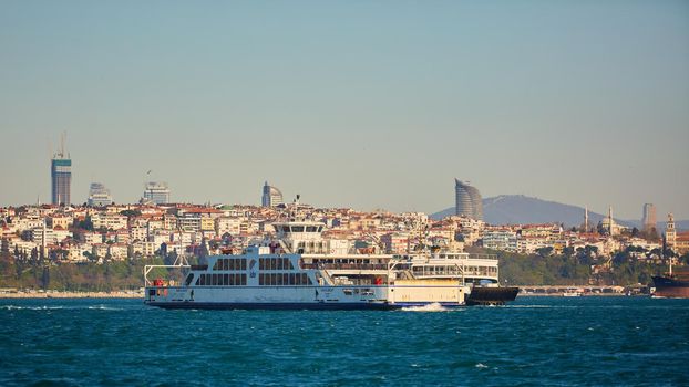 Istanbul, Turkey - 1 April, 2017: Passenger ship crossing Bosporus at spring day