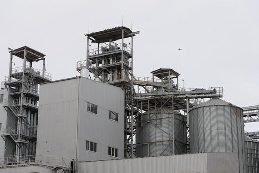 Industrial zone. metal buildings of the sunflower oil plant.