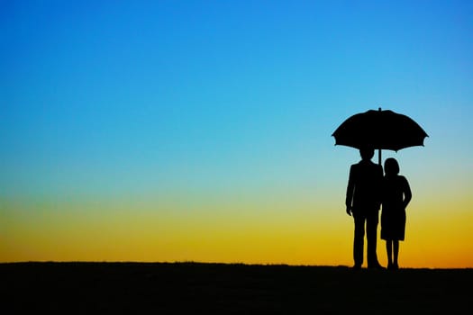 Couple standing on the hill at dusk. Shooting Location: Tokyo metropolitan area