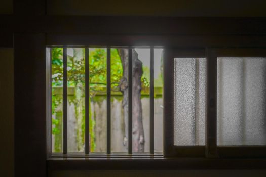 Landscape seen from the edge of the Japanese house. Shooting Location: Tokyo metropolitan area